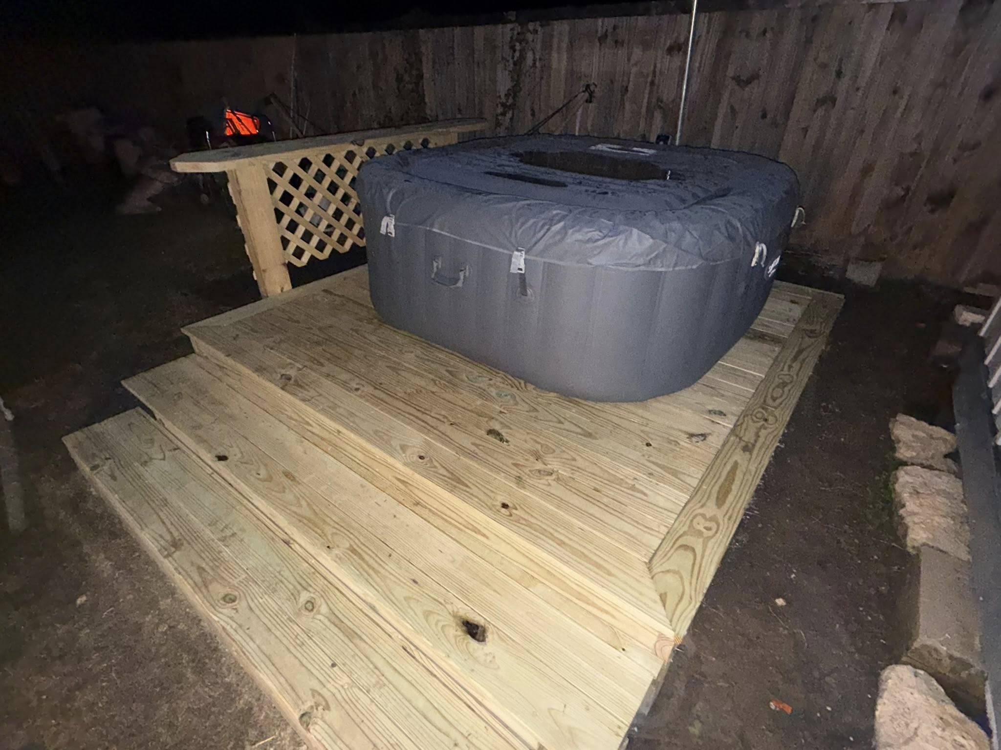Backyard deck platform with hot tub