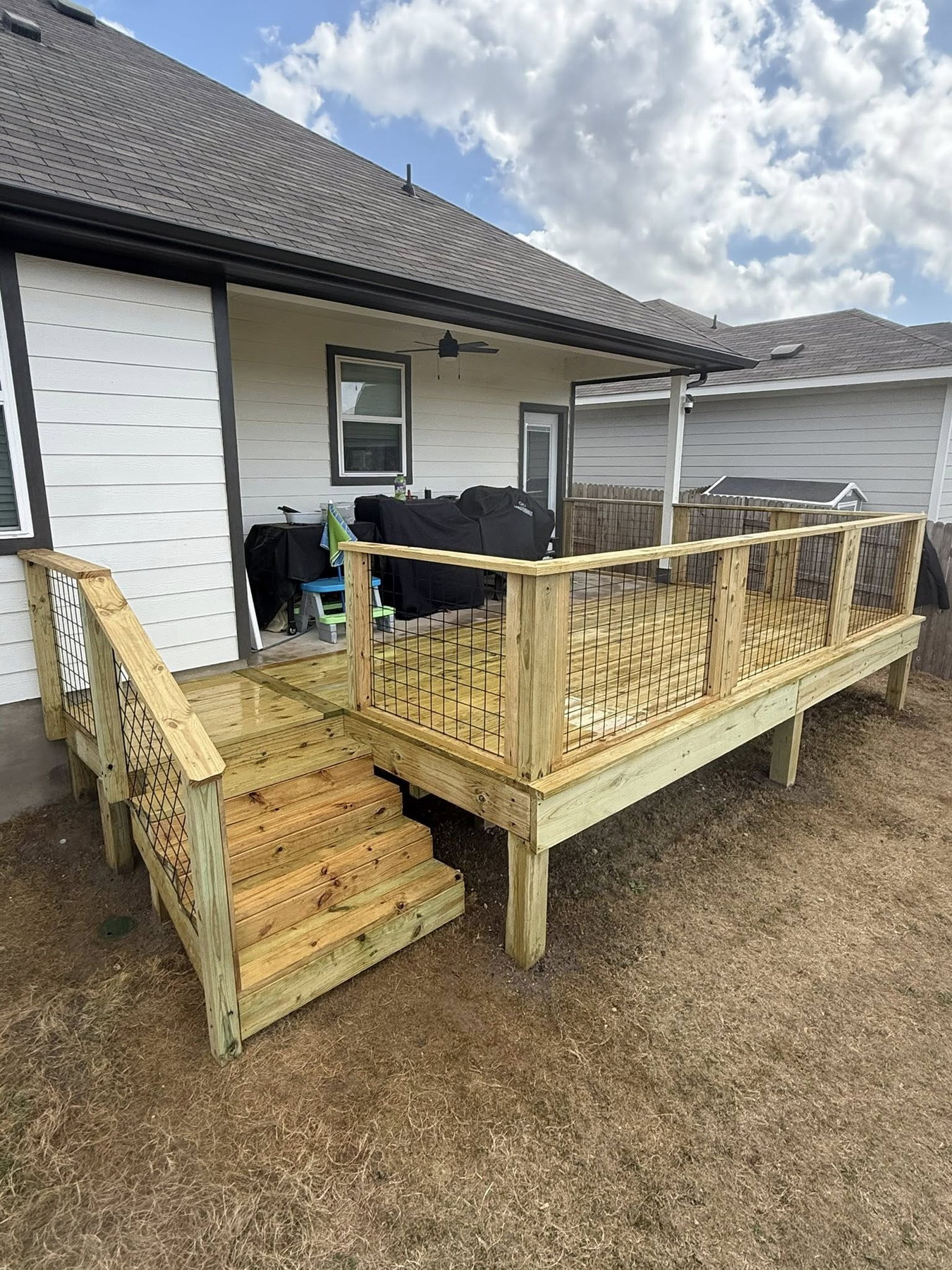 New pressure-treated deck with stairs