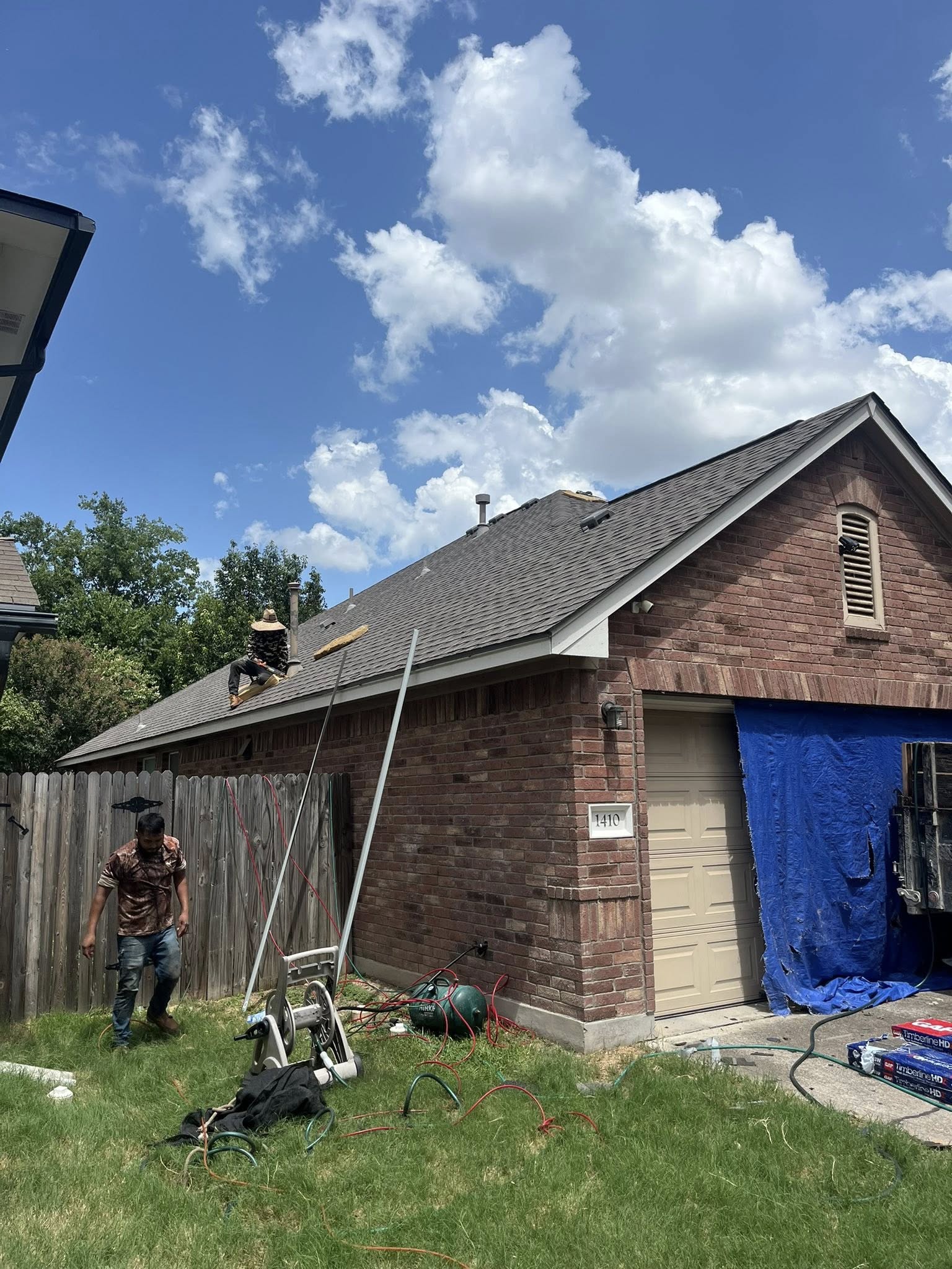 Shingle roof replacement on a brick home