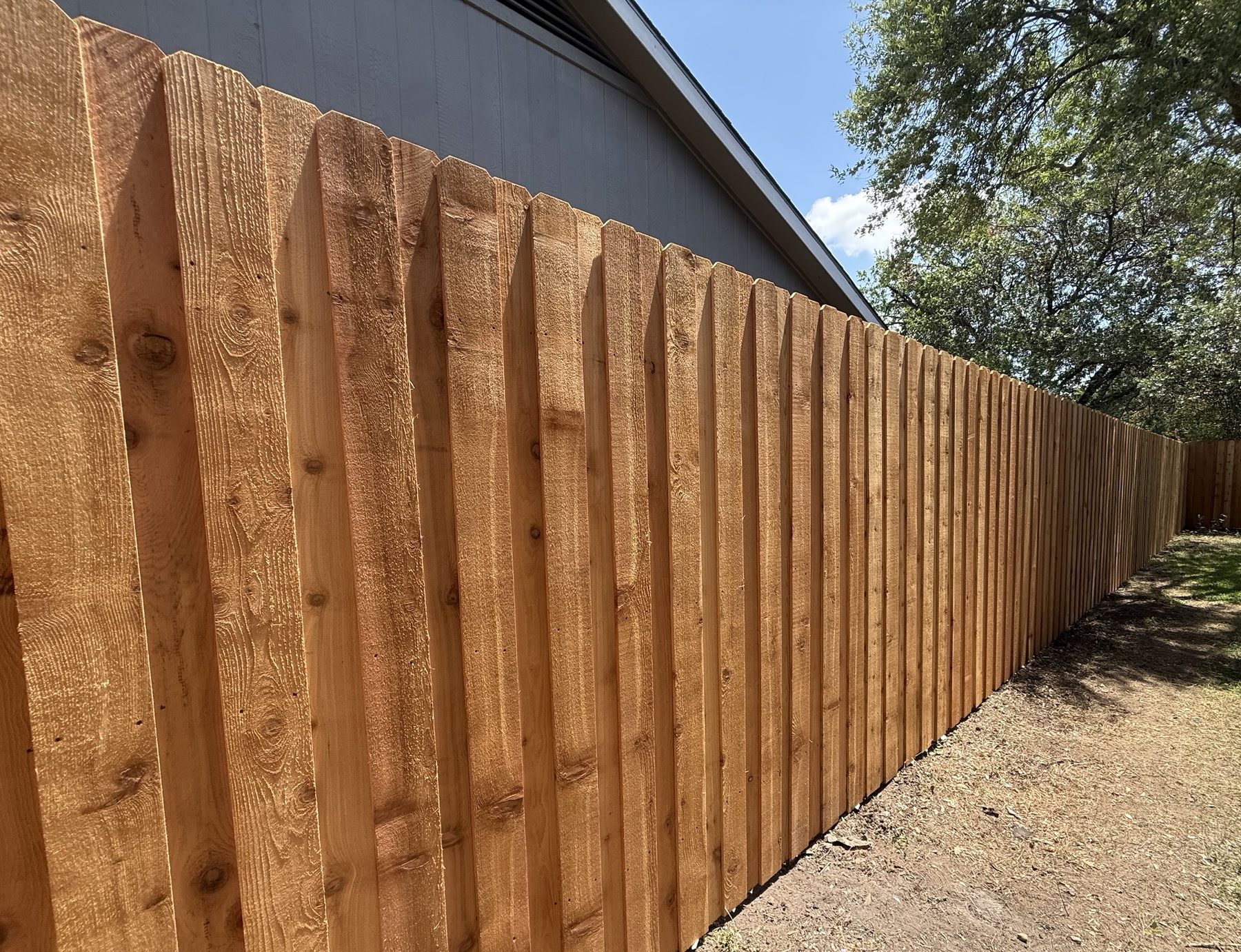 Six-foot cedar dog-ear privacy fence installed in Austin, TX