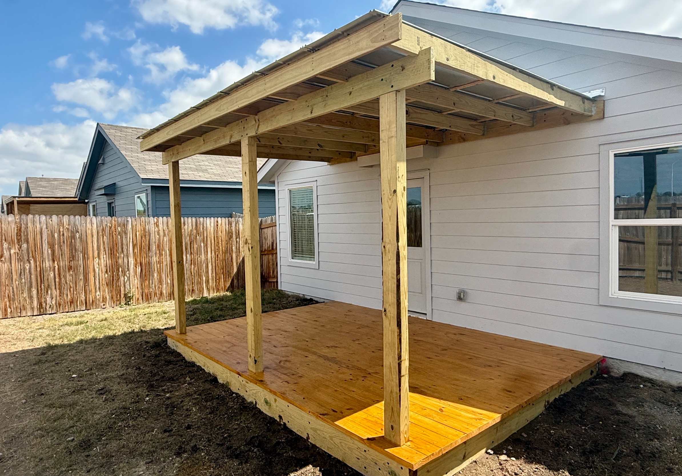 Lean-to patio cover with corrugated metal roof, Austin TX
